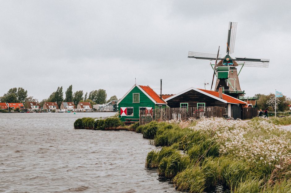 Explore the scenic windmills and traditional Dutch houses along the water in Kinderdijk.